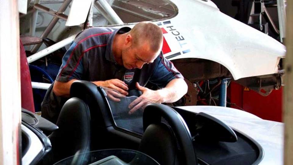 Dave repairs a Porsche Boxster hood