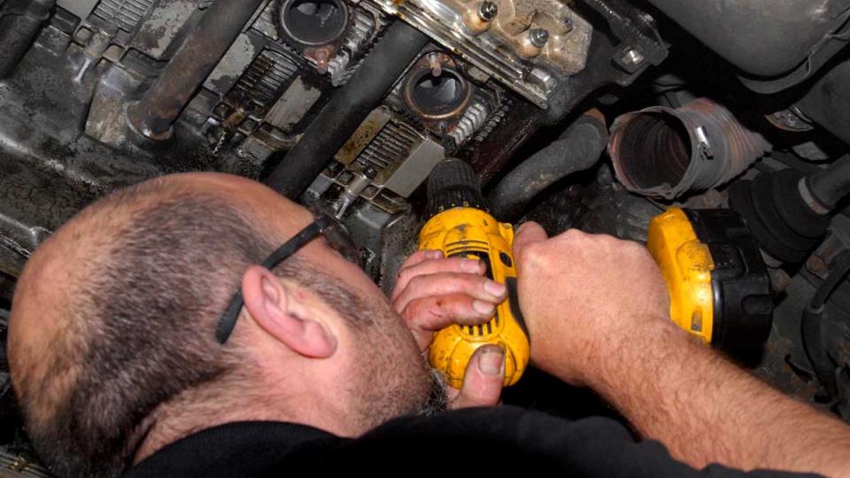 Ashley drills out snapped rusty exhaust manifold studs at Braunton