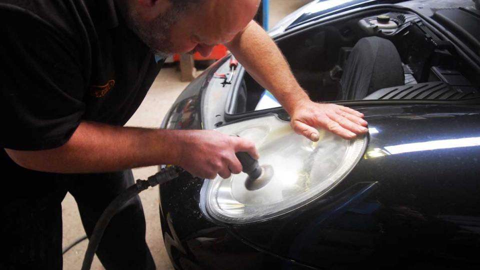 Headlight lens polishing to remove discolouration on the 996