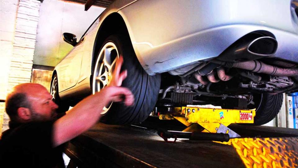 Checking the Porsche 996 tyres at MOT test