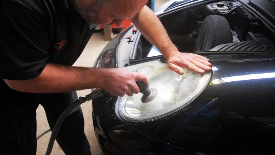 Ashley polishes the 996 911 headlight lens